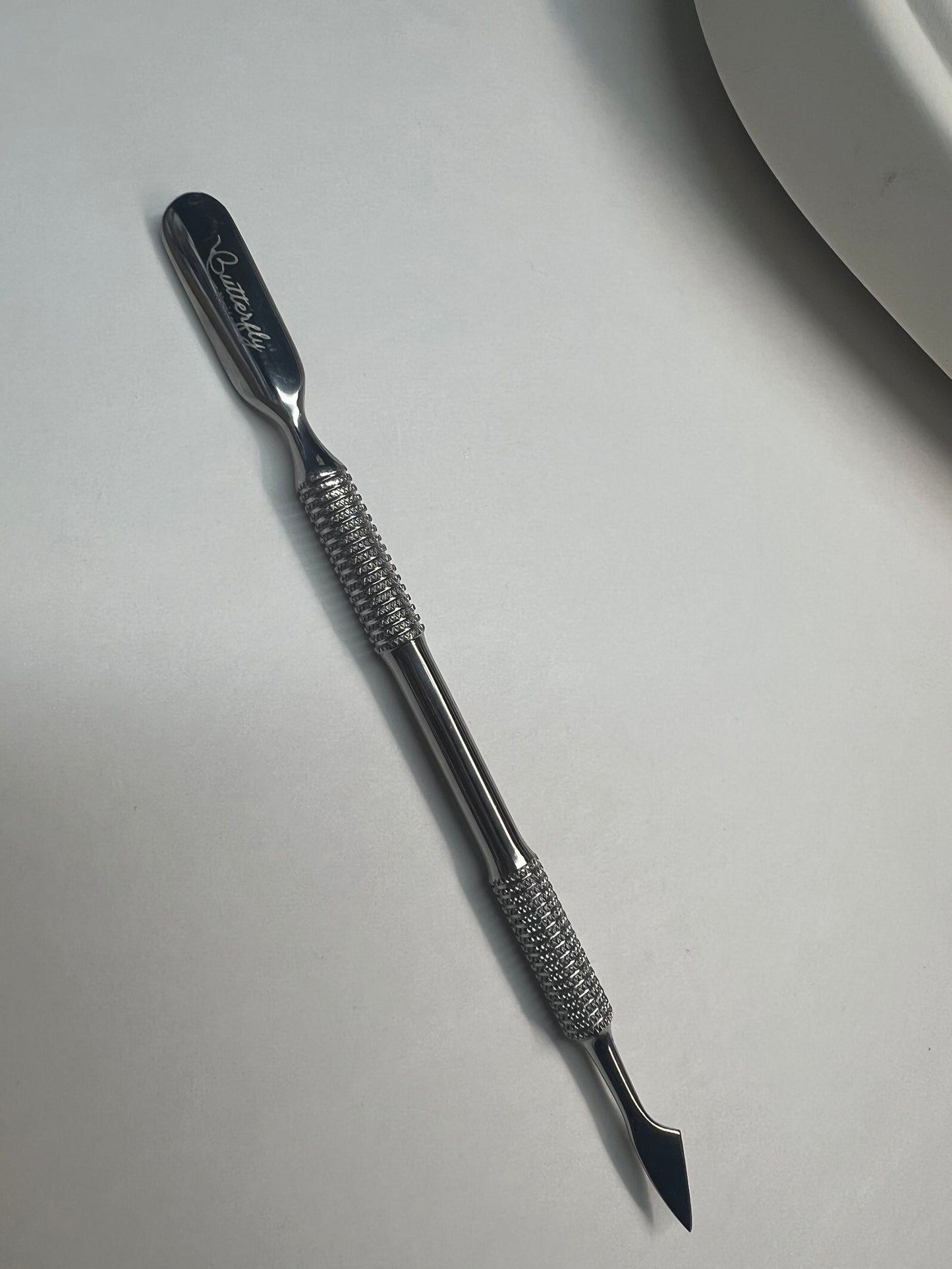 Empujador de cutícula